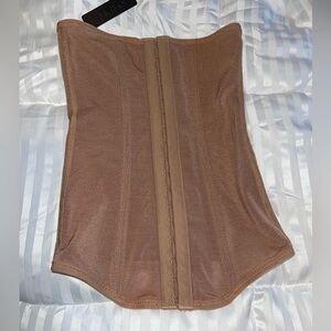 Nude/tan waist trainer from Skims